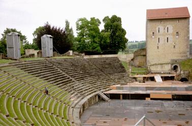 The Roman amphitheatre at Avenches - note the great advances that have been made in portapotty miniaturisation since the days of the Romans!